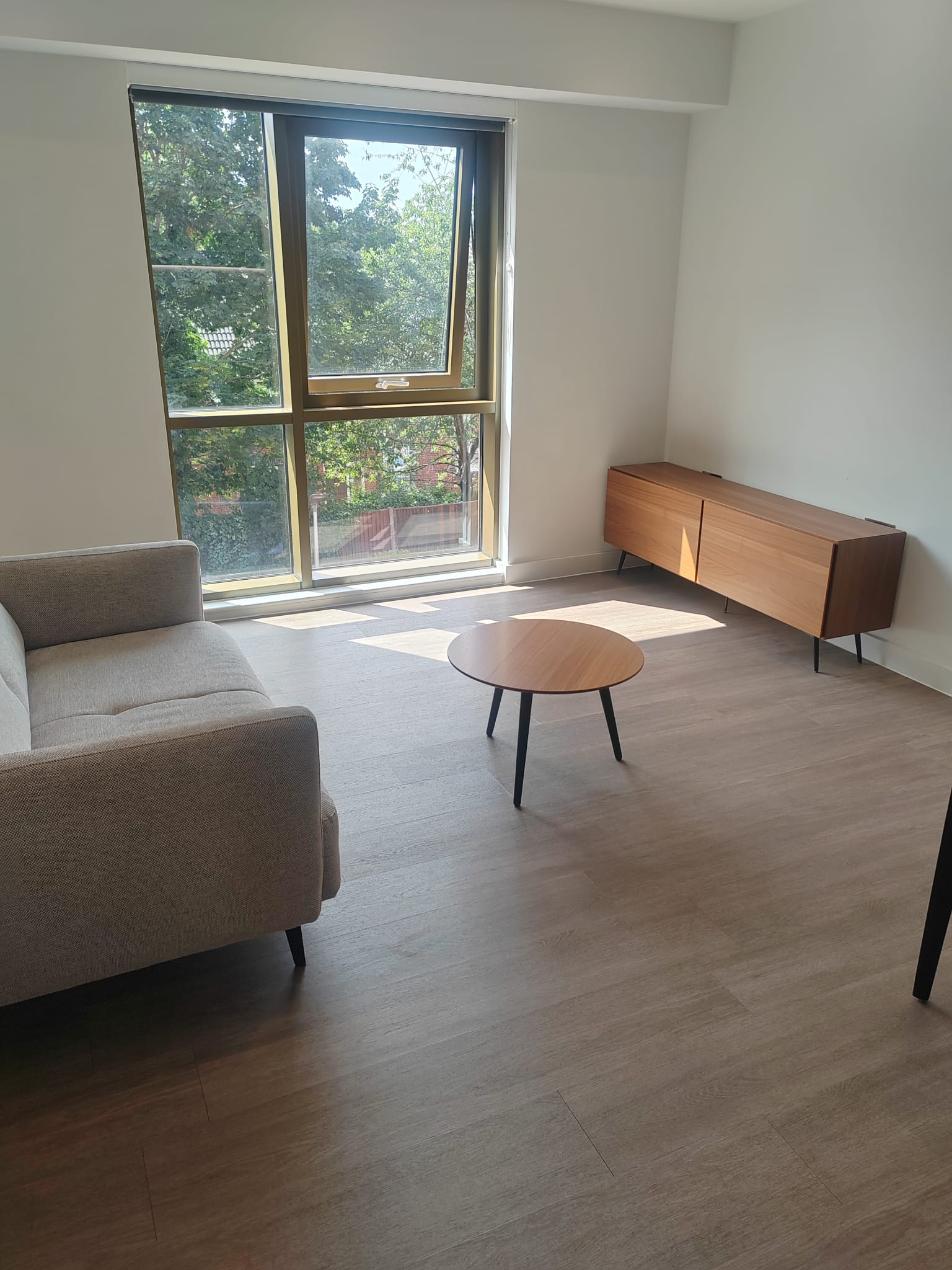 Empty living room with floors and surfaces cleaned ready for a tenancy check-out