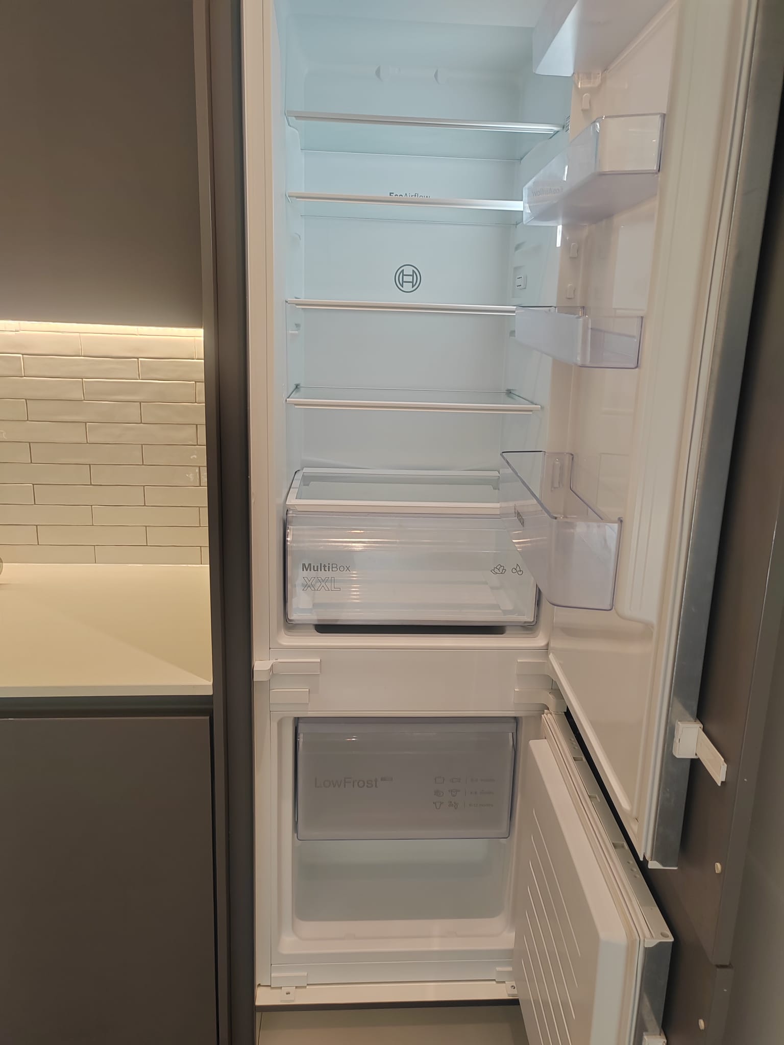 Interior of a fridge freezer cleaned and left spotless after an end of tenancy clean